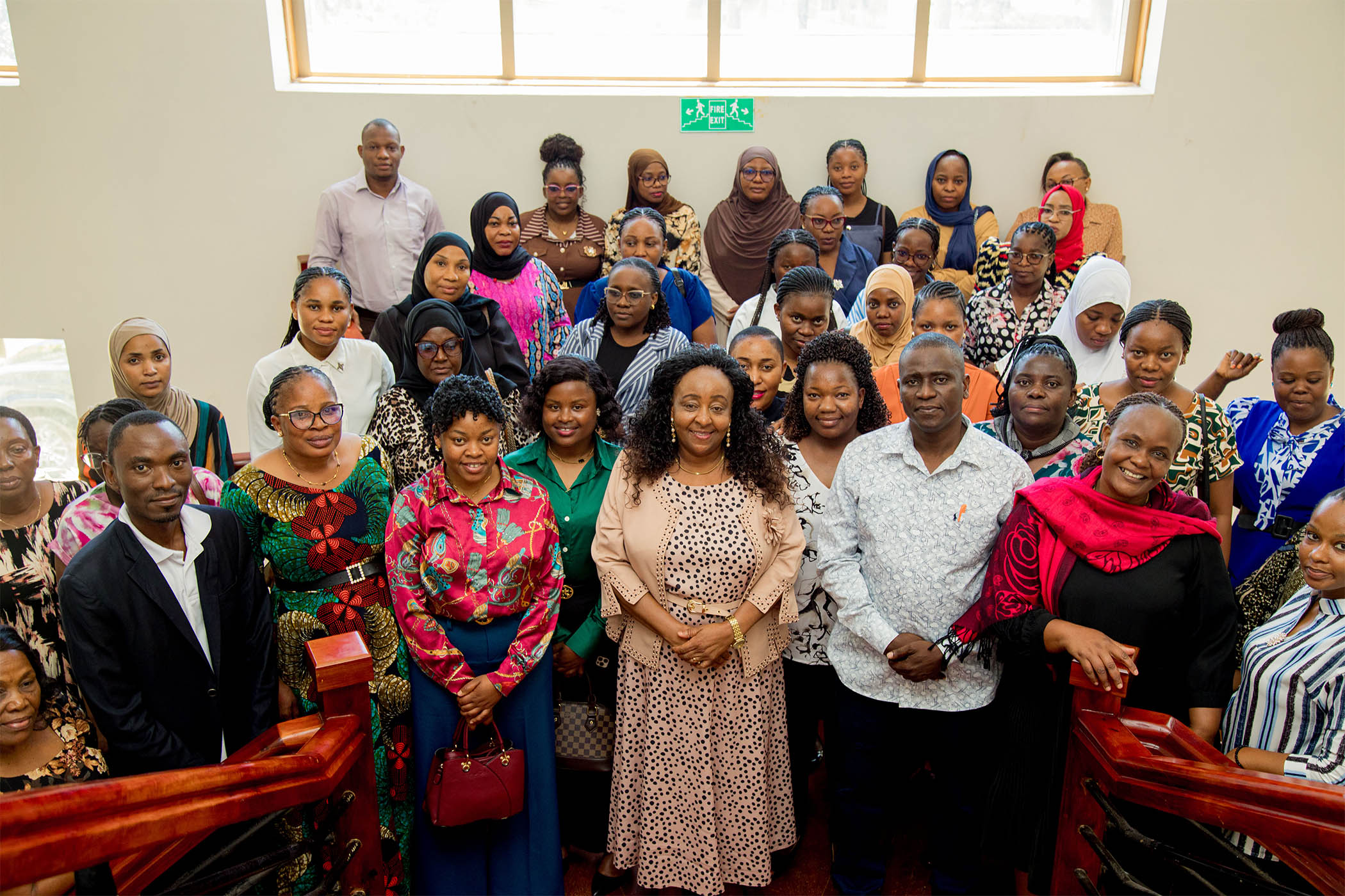 The Executive Secretary of the National Kiswahili Council (BAKITA), Bi. Consolata P. Mushi, in a group photo with some participants of the Training on Proficiency in Standard and Proper Kiswahili for Office Secretaries and Administrative Assistants, which